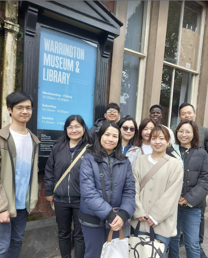 Happy students outside Warrington Museum on a visit.